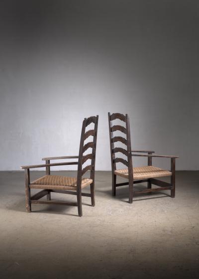 Pair of carved wood armchairs
