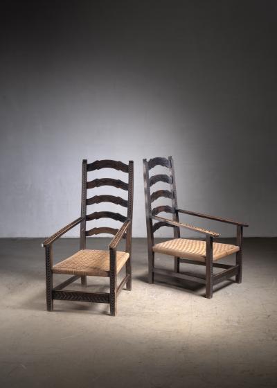 Pair of carved wood armchairs