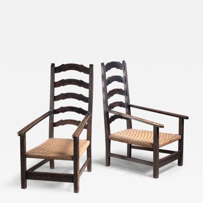 Pair of carved wood armchairs