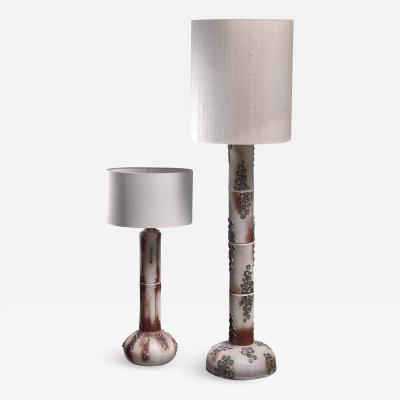 Pair of ceramic floor lamps with blue blossom like pattern