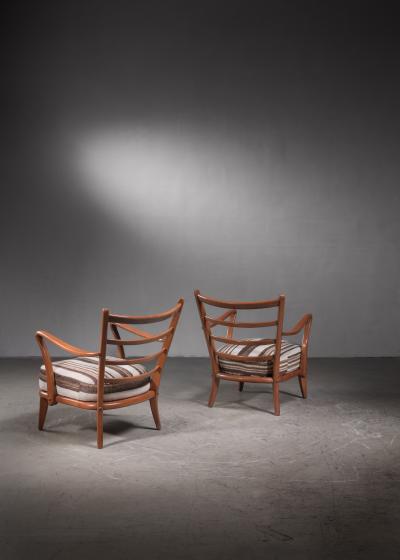 Pair of cherry wood armchairs