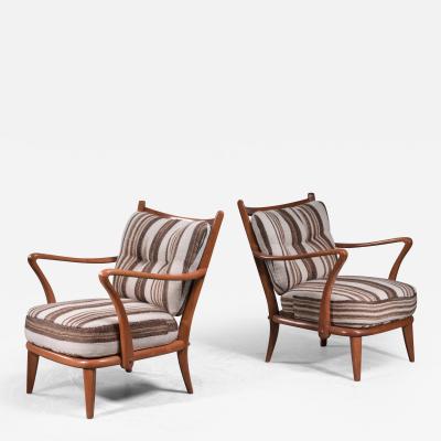 Pair of cherry wood armchairs