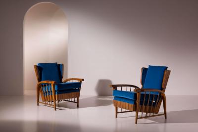 Pair of cherrywood lounge chairs Italy 1950s