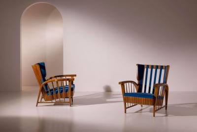 Pair of cherrywood lounge chairs Italy 1950s
