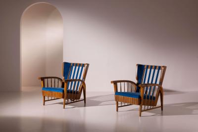 Pair of cherrywood lounge chairs Italy 1950s