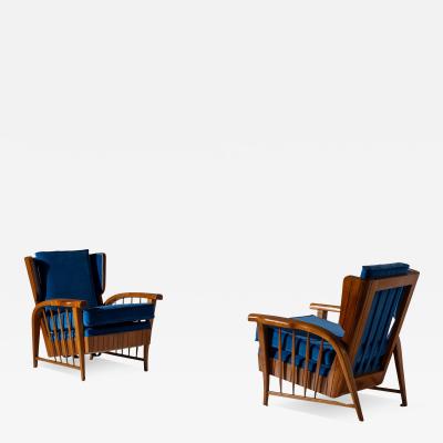 Pair of cherrywood lounge chairs Italy 1950s