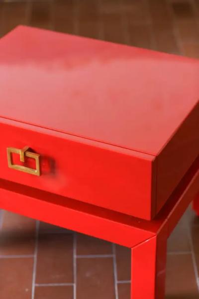 Pair of china red bedside tables with brass details from the 1970s