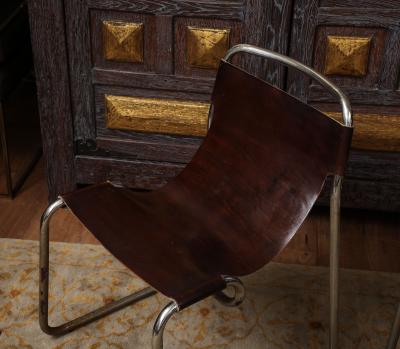 Pair of chrome and leather sling chairs