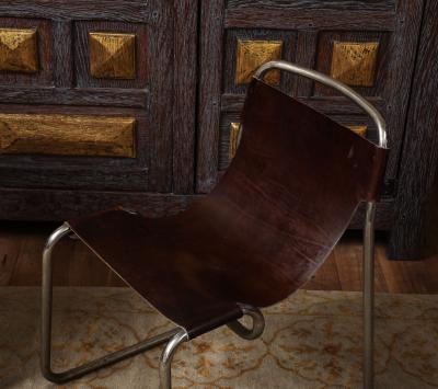 Pair of chrome and leather sling chairs