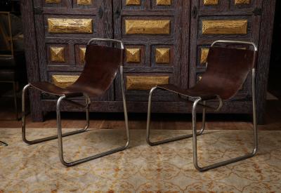Pair of chrome and leather sling chairs