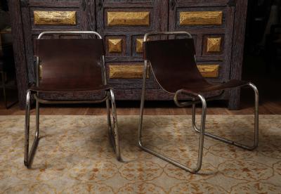 Pair of chrome and leather sling chairs