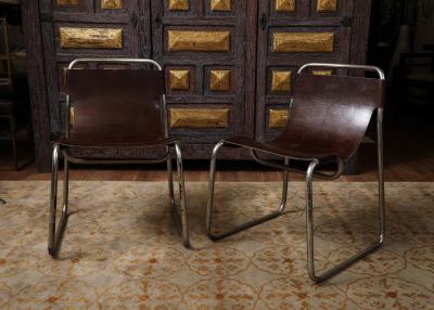 Pair of chrome and leather sling chairs