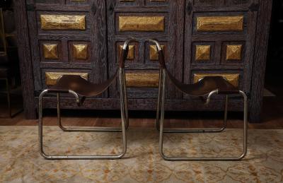 Pair of chrome and leather sling chairs