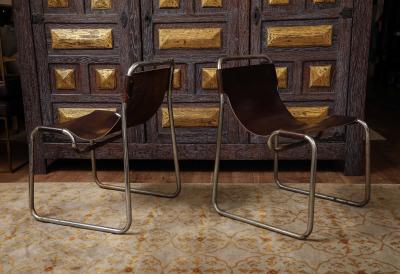 Pair of chrome and leather sling chairs