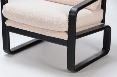 Pair of ebonized French open armchairs recently upholstered in Boucle fabric 