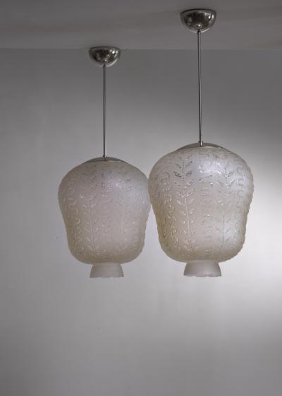 Pair of etched frosted glass pendants