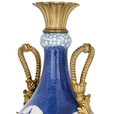Pair of gilt bronze and Chinese blue and white porcelain vases