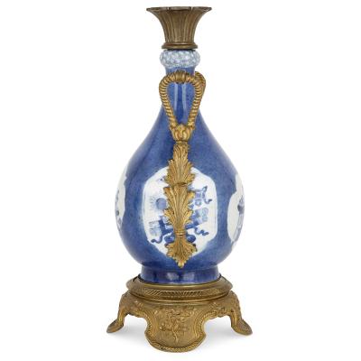 Pair of gilt bronze and Chinese blue and white porcelain vases