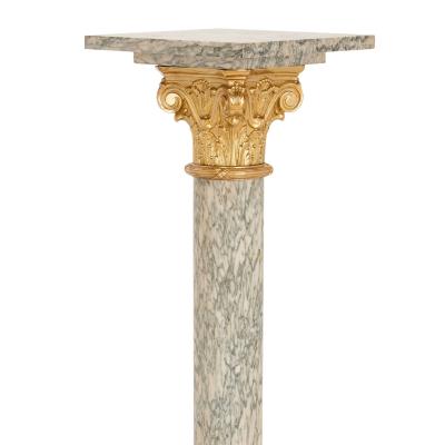 Pair of gilt bronze and marble columns in the Neoclassical style