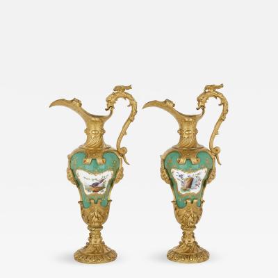 Pair of gilt bronze mounted porcelain vases in manner of S vres