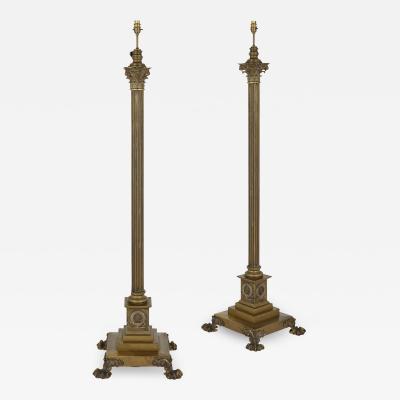 Pair of gilt bronze standing floor lamps