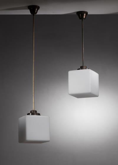 Pair of glass cube pendants