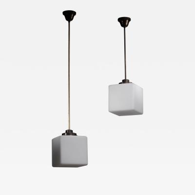 Pair of glass cube pendants