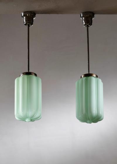 Pair of green glass pendants