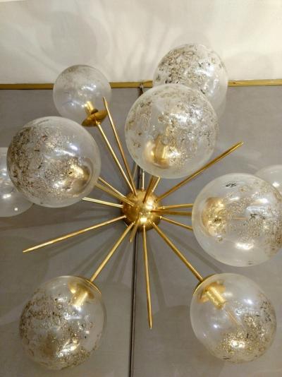 Pair of half sputnik wall lights with globes made by Seguso