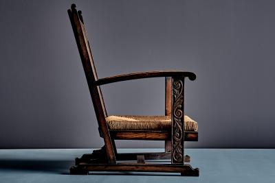 Pair of high Back Armchairs with carved Details and Rush Seats
