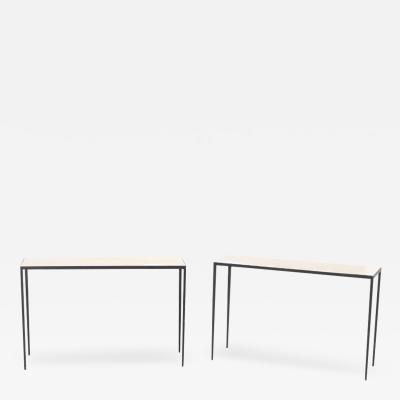 Pair of iron and parchment console tables having tapered legs 