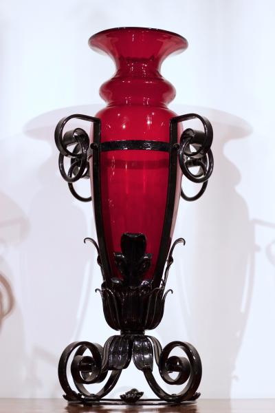 Pair of iron and red glass vases Italy 1920