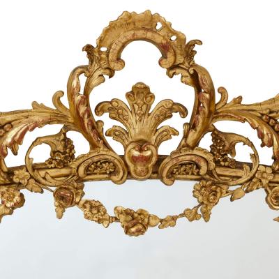 Pair of large Rococo revival giltwood mirrors