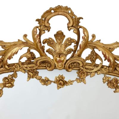 Pair of large Rococo revival giltwood mirrors