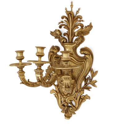 Pair of large gilt bronze sconces in the R gence style