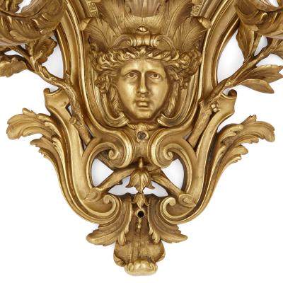 Pair of large gilt bronze sconces in the R gence style