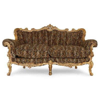 Pair of large ornate giltwood antique sofas