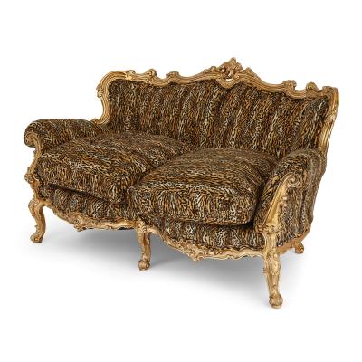 Pair of large ornate giltwood antique sofas