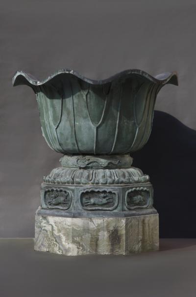 Pair of massive patinated bronze Li n flower form vases