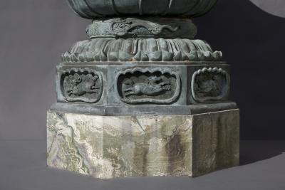 Pair of massive patinated bronze Li n flower form vases