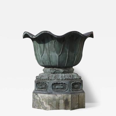Pair of massive patinated bronze Li n flower form vases