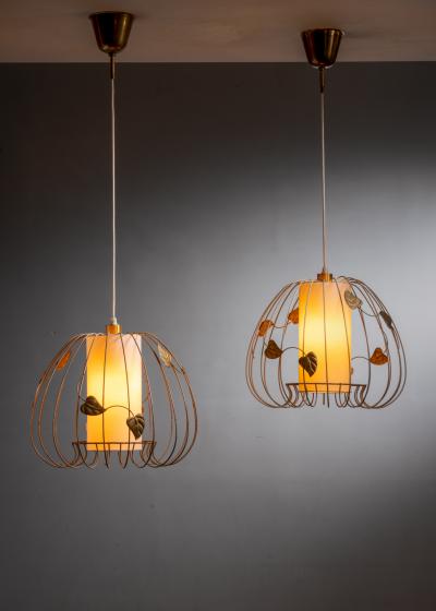 Pair of metal cage pendant lamps