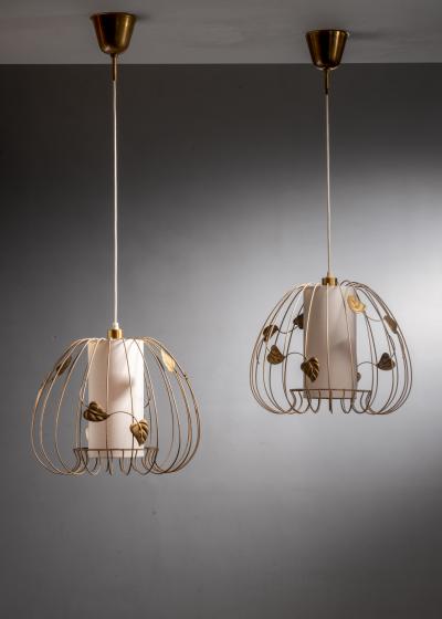 Pair of metal cage pendant lamps