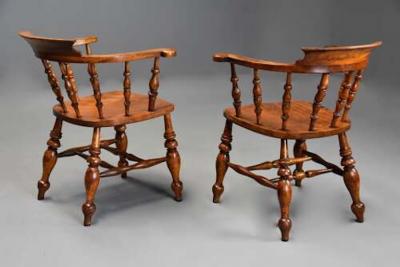 Pair of mid 19th century birch smokers bow Windsor or Captain s chairs