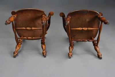 Pair of mid 19th century birch smokers bow Windsor or Captain s chairs