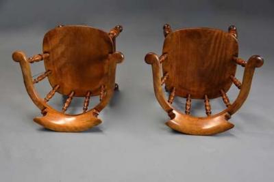 Pair of mid 19th century birch smokers bow Windsor or Captain s chairs
