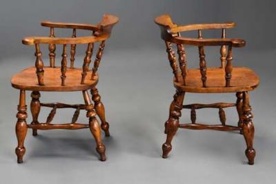 Pair of mid 19th century birch smokers bow Windsor or Captain s chairs