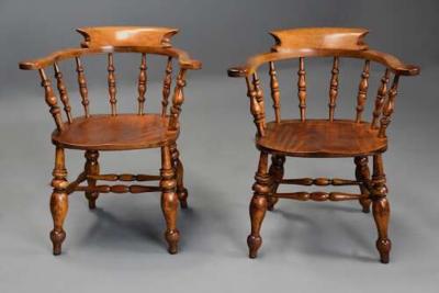 Pair of mid 19th century birch smokers bow Windsor or Captain s chairs