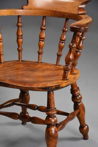 Pair of mid 19th century birch smokers bow Windsor or Captain s chairs
