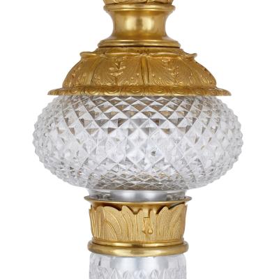 Pair of monumental gilt bronze and glass floor standing candelabra